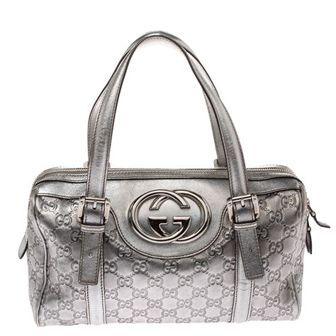 white gucci bag with silver hardware|Gucci silver handbag.